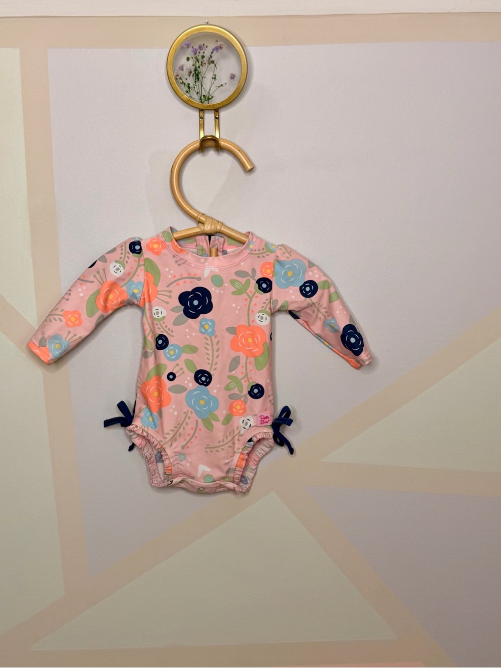 Ruffle Butts Pink Floral Long-Sleeve Swim Bodysuit with Navy Bows